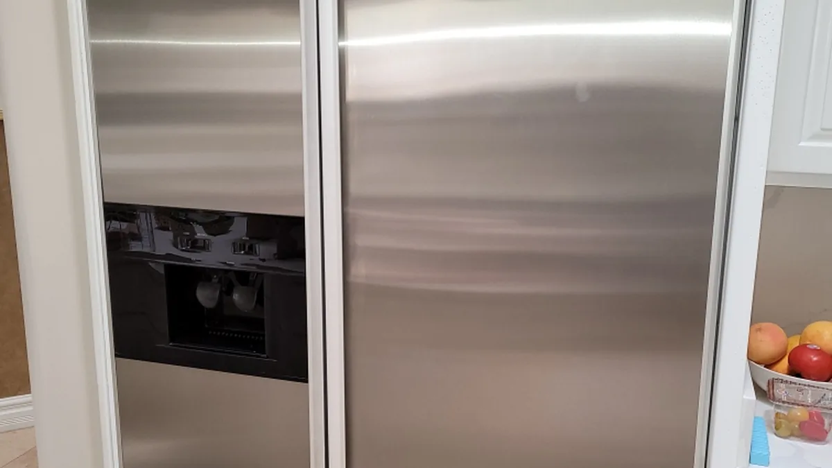 Factory-certified appliance repair technician servicing luxury refrigeration, laundry suites, and cooking ranges in Alsip, IL